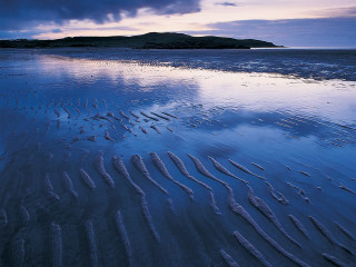 Beach sunset sand water island 2 - a small island in the distance free wallpaper
