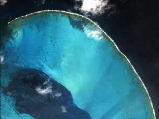 Blue island ocean sky clouds - aerial free wallpaper