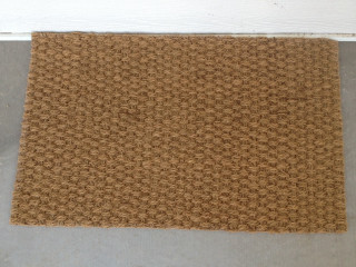 Cat laying rug floor doorway - a cat free wallpaper