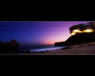Building hill ocean night lights 3 - almada negreiro free wallpaper