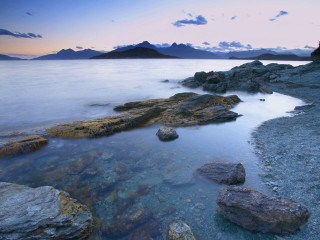 Water rocks mountains dusk person - dusk free wallpaper