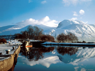 Boat docked harbor mountains snow 2 - a harbor free wallpaper