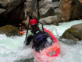 Man red kayak river rocks 2 - a red helmet free wallpaper