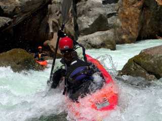 Man red kayak river rocks 3 - a red helmet free wallpaper