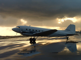 Small plane runway sunset cloudy - atmospheric free wallpaper