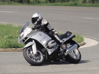 Man cybermotorcycle greenfield blurry helmet - a man riding free wallpaper