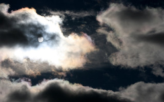 Bright sun clouds night sky - a photo free wallpaper