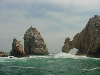 Large rock formation ocean waves - wave free wallpaper