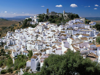 Village white buildings tower hill - top of a hill free wallpaper
