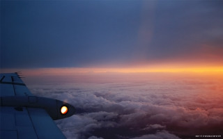 Plane wing sunset clouds light 2 - the sun free wallpaper