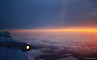 Plane wing sunset clouds light 3 - the sun free wallpaper