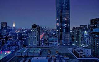City skyline night tall buildings 4 - neoism free wallpaper