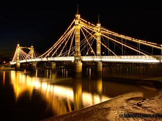 Lit bridge night reflection people - bruce munro free wallpaper