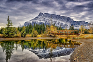 Bridge lake mountain cloudy sky - a bridge in the foreground free wallpaper
