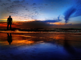 Man beach sunset reflection sky - a reflection of the sky free wallpaper