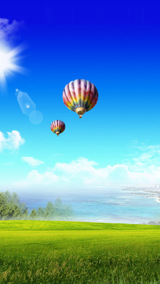 Two hot air balloons over 2 - the ocean free wallpaper