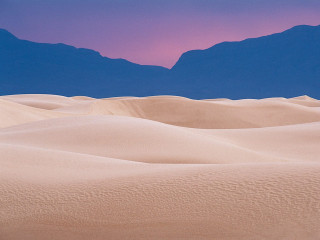 Desert mountain range pink sky 6 - a mountain range in the distance free wallpaper