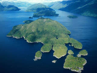 Island water mountains cloudy sky - a cloudy sky above free wallpaper