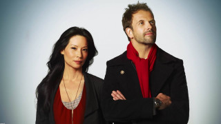 Man woman serious arms crossed - their face free wallpaper