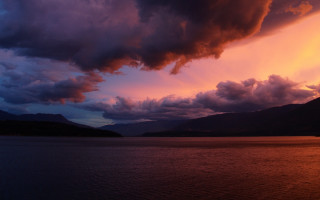 Sunset lake mountain boat clouds - a sunset over a lake free wallpaper