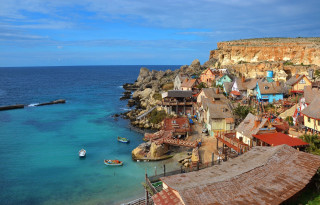 Village shore water boat cliff - bascove free wallpaper