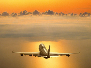 Plane flying sky sun clouds 2 - a plane free wallpaper
