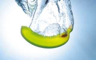 Banana dropping into water ice - ice free wallpaper