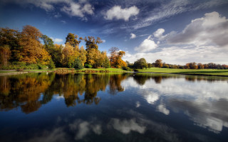 Lake trees clouds golf course - a green field and trees free wallpaper