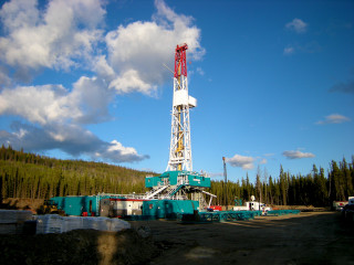 Drilling rig forest sky clouds - the foreground free wallpaper