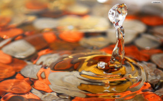 Colorful surface water drop orange - abstract illusionism free wallpaper