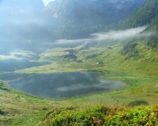 Grassy field lake mountains fog - coppo di marcovaldo free wallpaper