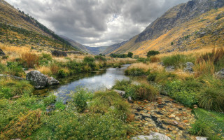 River valley mountains grass rocks - the valley free wallpaper