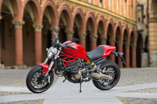 Red motorcycle parked street building - arch free wallpaper