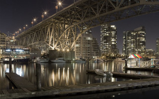 Bridge water boat city night 3 - the water and a city in the background free wallpaper