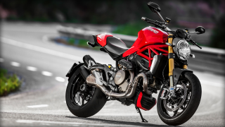 Red motorcycle parked road sign - path free wallpaper