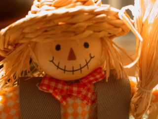Scarecrow doll strawhat redbow tie 3 - evaline ness free wallpaper