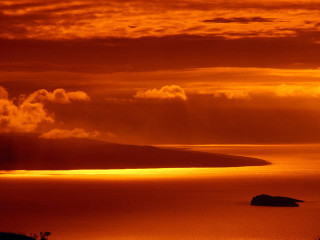 Sunset over water boat clouds - free ship wallpaper