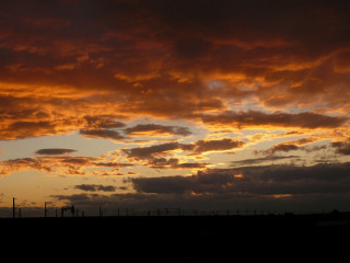 Sunset clouds fence field sky 2 - in the foreground free wallpaper