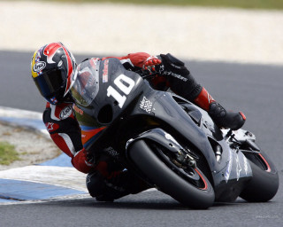 Motorcycle curve leaning helmet track - a motorcycle free wallpaper