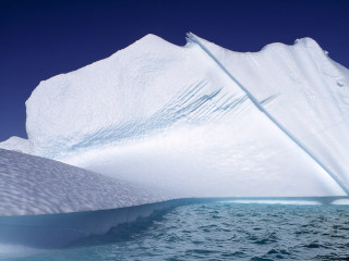 Large iceberg floating ocean blue 2 - the ocean next free wallpaper