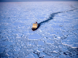 Boat floating ice ocean water - ecological art free wallpaper