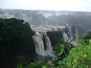 Waterfall trees foggy skies nature - a large waterfall free wallpaper