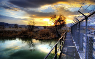 Fence water sunset chainlink serene - a fence free wallpaper