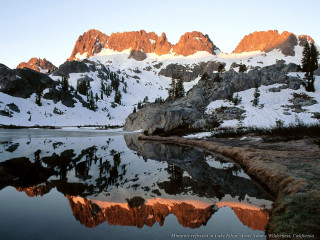 Mountain range lake snow background 4 - a lake in the foreground free wallpaper