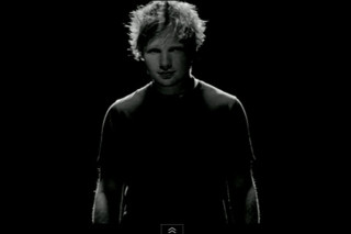 Man standing dark head turned - video art free wallpaper