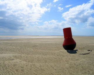 Red vase sandy beach ocean - free bikini wallpaper
