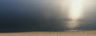 Lone boat water beach sand 3 - zenith view free wallpaper