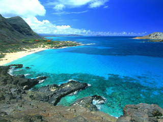 Blue ocean sandy beach mountains 4 - sandy free wallpaper