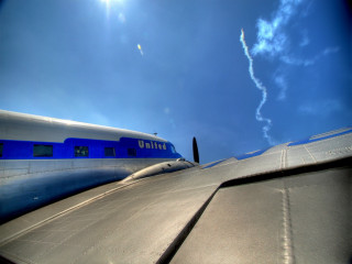 Plane wing sunlight clouds blue - a view of the wing free wallpaper