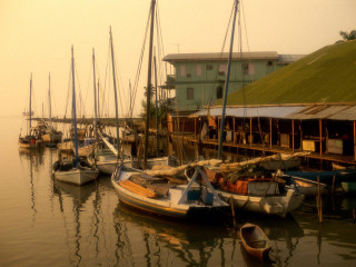 Boats water building grass roof 4 - ektachrome photograph free wallpaper